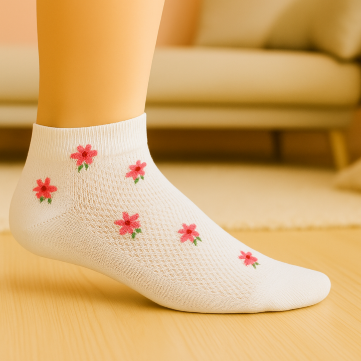 Détail des motifs fleuris SENNA – maille coton – VPC Mania grossiste